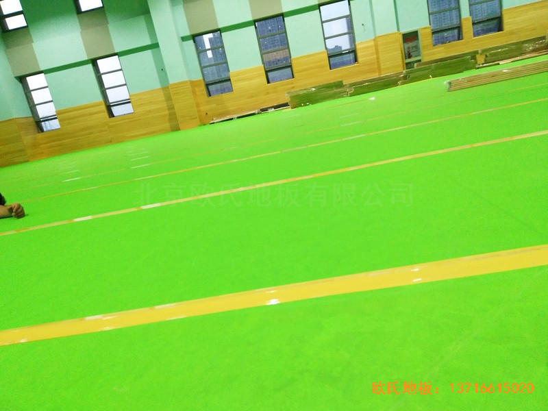 武漢廣阜屯小學(xué)清江錦城分?；@球館運動木地板施工案例3